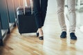 Businessman and businesswoman hold luggage travel to business trip Royalty Free Stock Photo