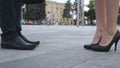 Businessman and businesswoman meeting at city street and greeting each other. Business handshake between man and woman Royalty Free Stock Photo