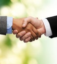 Businessman and businesswoman shaking hands Royalty Free Stock Photo