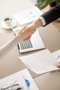 Businessman and businesswoman shaking hands, signing contract, t Royalty Free Stock Photo