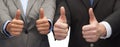 Businessman and businesswoman showing thumbs up Royalty Free Stock Photo