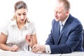 Businessman and businesswoman signing a papers Royalty Free Stock Photo