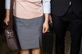 Businessman and businesswoman standing in an elevator Royalty Free Stock Photo