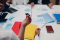 Businessman and businesswoman team meditate and holds hands each other after office meeting. Business people group Royalty Free Stock Photo