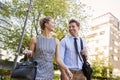Businessman And Businesswoman Walk to Work Through City Park Royalty Free Stock Photo