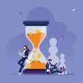 Businessman and businesswoman work near a large hourglass-Time is money concept
