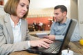 Businessman and businesswoman working during lunch Royalty Free Stock Photo