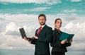 Businessman and businesswomen. Couple partnership in business. Young man and woman business couple. Portrait of two