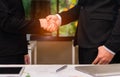 Businessman and businesswomen shaking hands Royalty Free Stock Photo