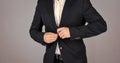 businessman button jacket. stylish man looking modern. mens jacket wardrobe. fashionable man dressed in suit. formal