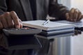 Businessman using calculator, work on laptop computer. Royalty Free Stock Photo