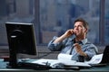 Businessman calling on landline at office Royalty Free Stock Photo