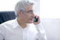 Businessman calling phone, senior gray hair Royalty Free Stock Photo