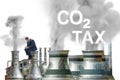 Businessman in carbon tax concept