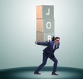 Businessman carrying the burden of his job