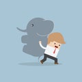 Businessman carrying elephant, Leadership concept Royalty Free Stock Photo