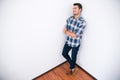 Businessman in casual cloth standing corner of the room