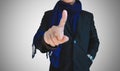 Businessman in casual suit pointing on empty space, selective focus on hand