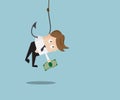 Businessman catch Money by Hanging with Fishing Hook Royalty Free Stock Photo