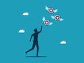 Businessman chasing a target flying away from him. Failing goals and finding goals. business concept