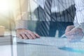 Businessman checking a document, light effect, double exposure Royalty Free Stock Photo