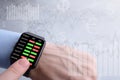 Businessman checking forex trading, stock market price from smart watch. Fintech intelligence technology enables user flexible and Royalty Free Stock Photo