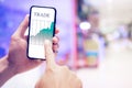 Businessman checking stock market data. He using a mobile phone.Trading on stock market with smartphone Royalty Free Stock Photo