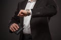 Businessman checking time Royalty Free Stock Photo