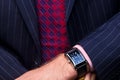 Businessman checking the time on his watch Royalty Free Stock Photo