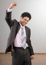 Businessman cheering and celebrating his success Royalty Free Stock Photo