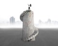 Businessman cheering on doodles concrete spiral tower