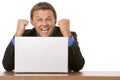 Businessman Cheering At Laptop Royalty Free Stock Photo