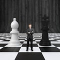 Businessman on chessboard