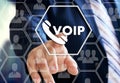 The businessman chooses VOIP on the virtual screen in social network connection Royalty Free Stock Photo