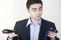 Businessman choosing his tie