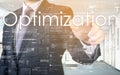 The businessman is choosing Optimization from touch screen Royalty Free Stock Photo