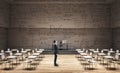 Businessman in clean classroom