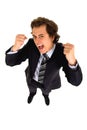 Businessman clenching fists Royalty Free Stock Photo