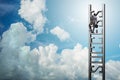 The businessman climbing the career ladder of success Royalty Free Stock Photo