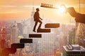 The businessman climbing the career ladder of success