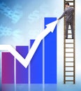 Businessman climbing towards growth in statistics Royalty Free Stock Photo