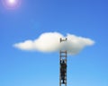 Businessman climbing on wooden ladder to reach cloud