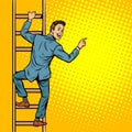 Businessman climbs stairs, man points to copy space Royalty Free Stock Photo