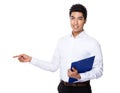 Businessman with clipboard and finger point aside Royalty Free Stock Photo