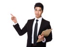 Businessman with clipboard and finger point up Royalty Free Stock Photo