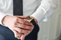 Businessman clock clothes, businessman checking time on his wristwatch. Royalty Free Stock Photo