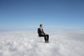 Businessman on a cloud Royalty Free Stock Photo