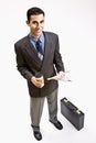 Businessman with coffee and newspaper Royalty Free Stock Photo