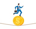 Businessman on coin walking on rope