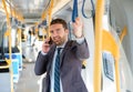 Businessman commuter is traveling Royalty Free Stock Photo